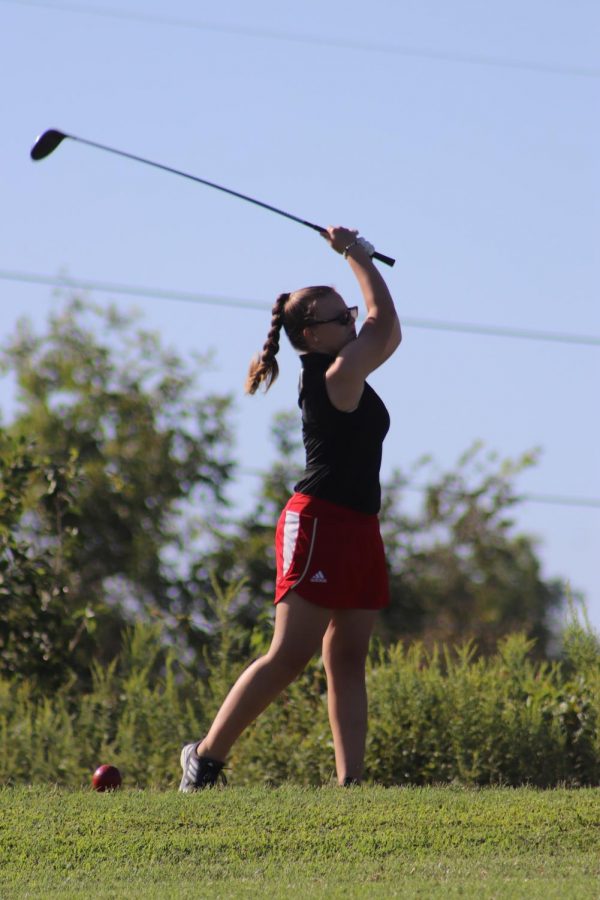 Junior+Alayna+Wells+takes+a+swing+down+the+course.+Over+the+long+offseason%2C+she+worked+on+her+game+and+improved%2C+but+as+a+team%2C+they+could+not+make+the+advances+they+had+hoped+for+due+to+COVID-19.+Coach+Larry+Steinmetz+said%2C+I+just+haven%E2%80%99t+been+able+to+work+with+them+as+much+as+I+normally+would+so+we+haven%E2%80%99t+gotten+that+progress+that+I+was+hoping+that+we+would.+I+was+hoping+that+we+would+take+a+pretty+big+jump+this+year+and+we+just+haven%E2%80%99t+had+the+opportunity+to+do+that.%E2%80%9D