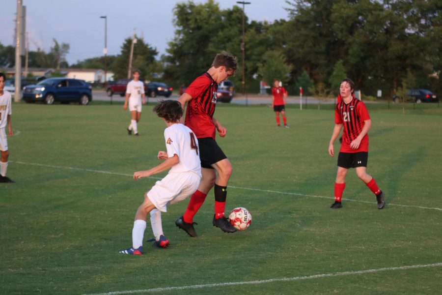 Senior Xavier Glauber taking the ball down the field. 