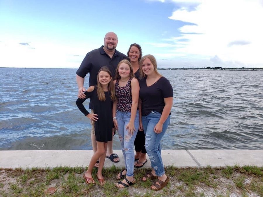 In warm weather, taking family pictures on summer vacation by the ocean. Jacob wanted to have a big family vacation with his family before passing, while everyone was taking individual photos we snapped ours. "I really had fun taking pictures and chasing everyone around, I will always remember this vacation," daughter Kailey Karner said.