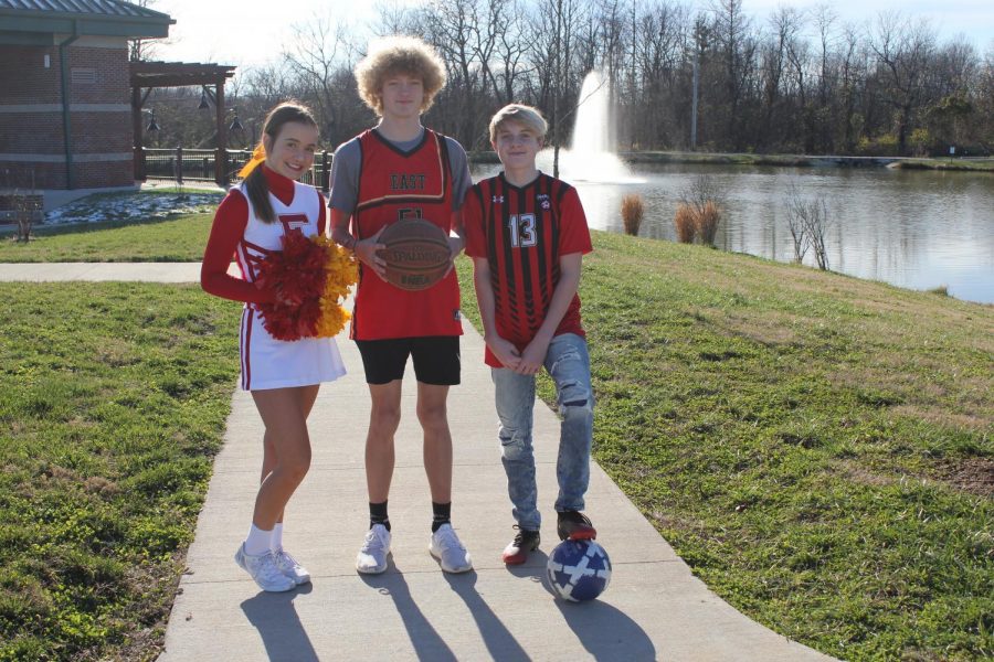 Jordyn Hawkins (left), Andrew Jackson (center), and Colton Jackson (right) wearing their team uniforms at Mount Washington Park.