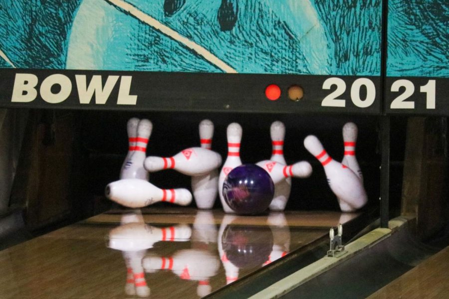 Bowling+ball+going+into+the+pins+under+the+numbers%3A+2021.+The+2021+season+for+this+year%E2%80%99s+bowling+team+went+pretty+good%2C+for+senior+Adam+Young%2C+in+his+opinion%2C+for+this+being+his+last+year+on+the+team.+%E2%80%9CI%E2%80%99m+going+to+miss+competing+in+these+kinds+of+tournaments%2C+and+playing+with+all+these+good+kids.+Im+going+to+miss+the+team+I+played+with%2C+and+grew+around.+This+team+means+a+lot+to+me%2C+and+Im+happy+I+got+to+bowl+with+them%2C+during+my+time+on+the+team.+I+also+want+to+thank+coach+Raley%2C+for+what+he%E2%80%99s+done+for+this+team%2C+and+I+want+to+thank+him+for+being+there%2C+and+just+supporting+us%2C+along+the+way%2C%E2%80%9D+Young+said.