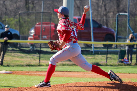 Senior Brock Hammond pitching a ball during their first game of the season. The first game of the season was a game against Christian Academy. “Its always tough starting the season with two losses, but this is when you see what people, and teams, are truly made of. This team is much better than we’ve shown, and I believe we’re all ready to go out, and show that,” Hammond said.