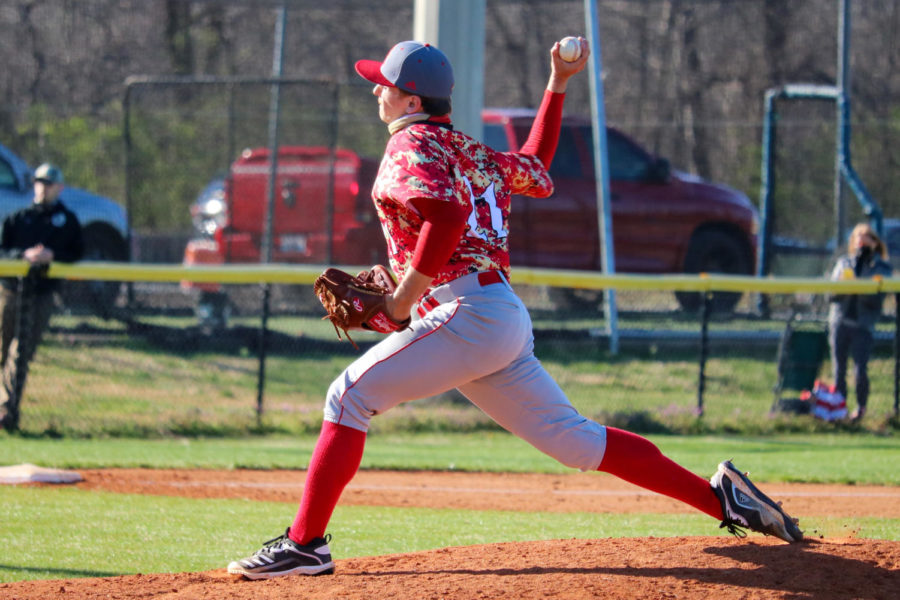 Senior Brock Hammond pitching a ball during their first game of the season. The first game of the season was a game against Christian Academy. “It's always tough starting the season with two losses, but this is when you see what people, and teams, are truly made of. This team is much better than we’ve shown, and I believe we’re all ready to go out, and show that,” Hammond said.