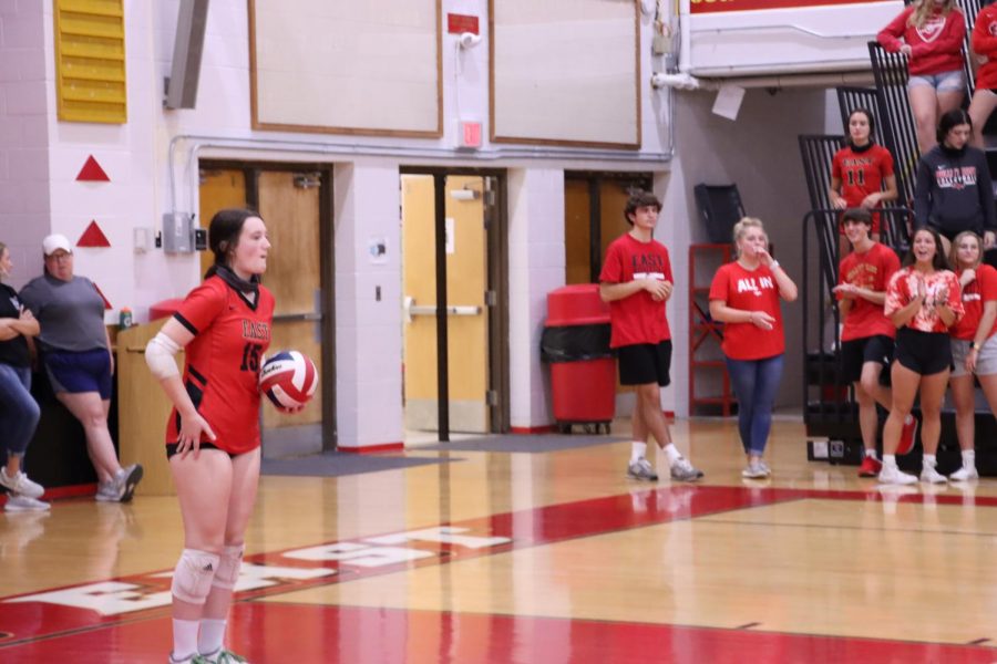 Grace Satterfield, Senior, goes to serve. Bullitt East ended up winning the game.