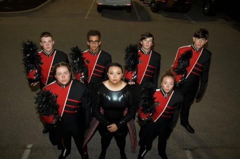 Marching Band seniors pose for photo at their first competition of the season. They are looking forward to continuing on the season and seeing where it takes them. 