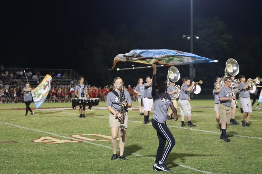 The Marching Band performing their show at half time during the home game  against Bullitt Central.