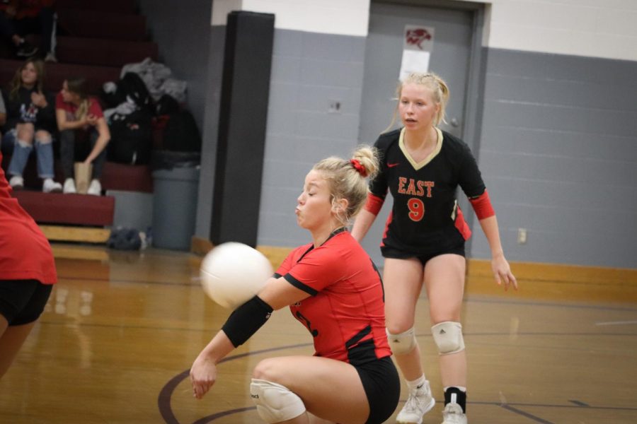 Senior Morgan Butler digs for the ball after a deep serve from Holy Cross. "We had games where we didn't receive the outcome we wanted but as a team we stood strong," Butler said.