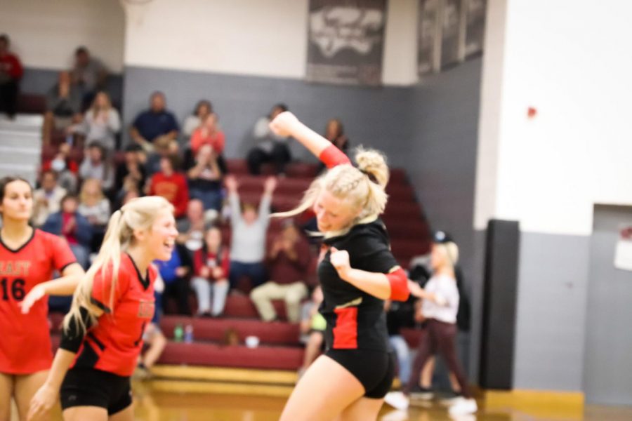 Junior Torrie Frist and senior McKenna Humphrey celebrating after a long rally in regionals. " I am definitely going to miss being everyone's biggest cheerleader and celebrating as a team," Humphrey said. 