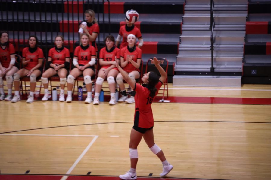 Senior Emily Huntsman serves the ball against Bullitt Central.