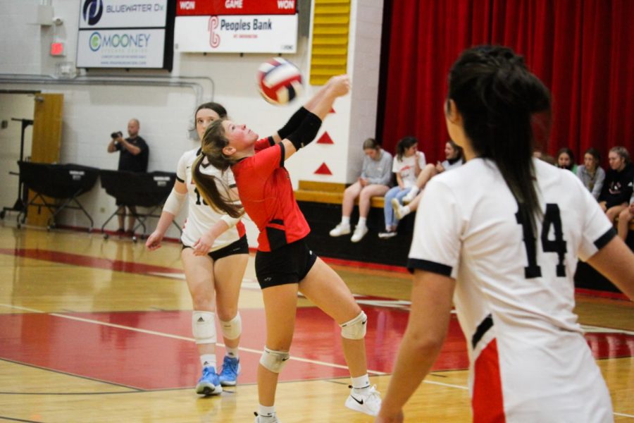 Junior Torrie Frist bumps the ball into the air after Bullitt Central attacks it. In order to keep up my playing time I always worked hard and pushed myself to be better and it turned out good in the end, Frist said.