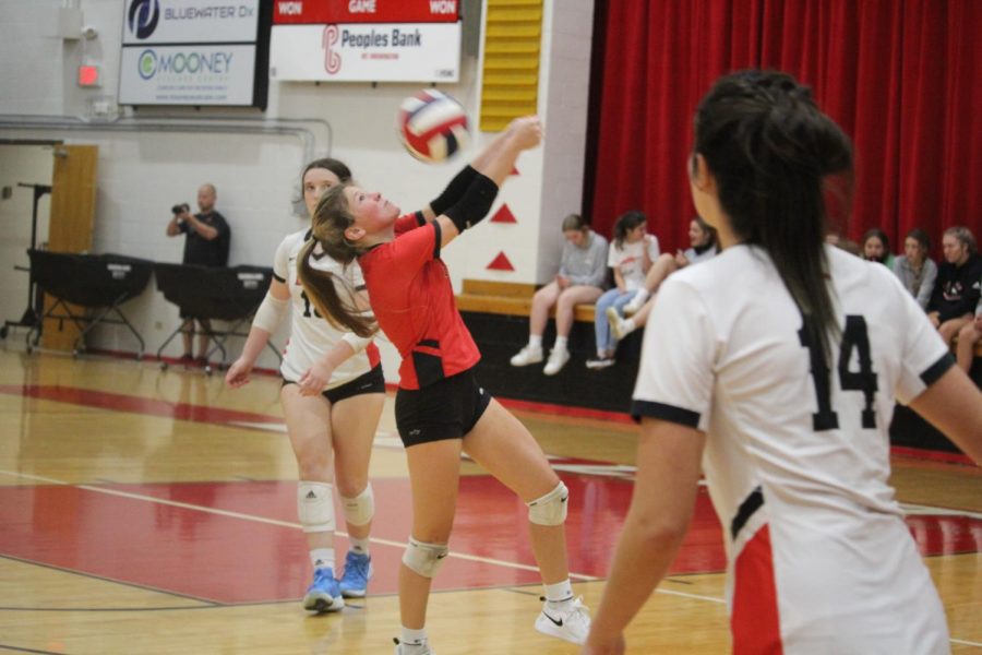 Junior Torrie Frist bumps the ball into the air after Bullitt Central attacks it. In order to keep up my playing time I always woked hard and pushed myself to be better and it turned out good in the end, Frist said.