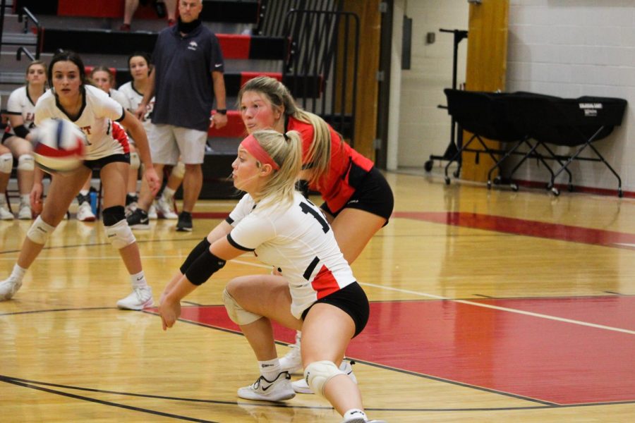 Senior Morgan Butler reaches out to save the ball as it approaches the ground. The girls played against Bullitt Central Sept. 30 and won 3-1. “After the game against North, it definitely set the tone for the rest of the week and coming out on top of our county,” Butler said.