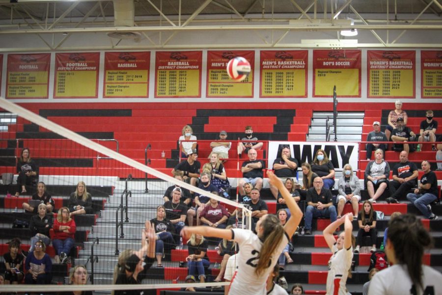 Junior Emma Brogan prepares to attack the ball after it's over the net. 