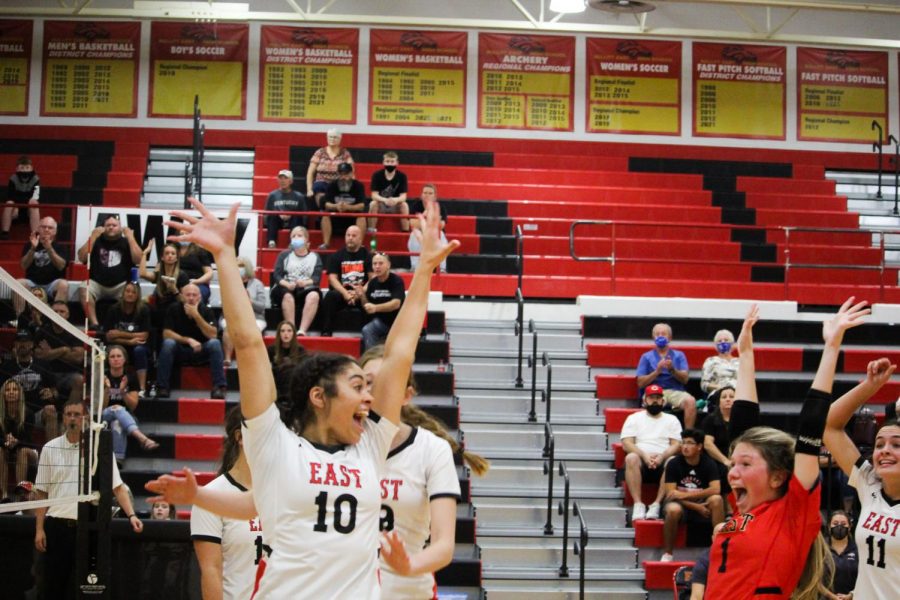 Players on the court celebrate as they get the kill. Bullitt East beat Bullitt Central 3-1 Sept. 30. "There is no better feeling than being a hitter and getting a kill, especially in tight games," junior Layla McAuliffe. 