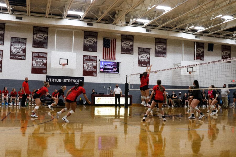 The Lady Chargers on the floor in their spots ready for the ball to return. "The game against Holy Cross isn't an accurate representation of our potential nor our capabilities as a team," sophomore Kate Cissell said. 