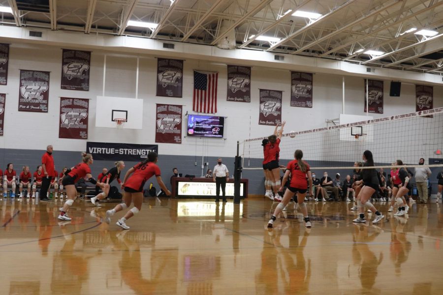 The Lady Chargers on the floor in their spots ready for the ball to return. "The game against Holy Cross isn't an accurate representation of our potential nor our capabilities as a team," Sophomore Kate Cissell said. 