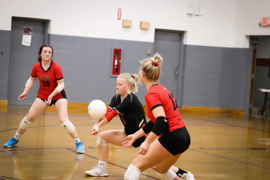 Senior McKenna Humphrey digs for the ball after a deep serve. The Lady Chargers played Holy Cross Oct. 25 in the first round of regionals and lost 3-1. "When you pass a hard driven ball perfectly it's the best feeling in the world," Humphrey said. 