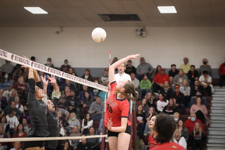 Sophomore Kate Cissell uses her height to jump up above the net and attack the ball. "Being able to attack the ball and get a flashy hit is great and all but I could literally never do it without the passers and setters," Cissell said.