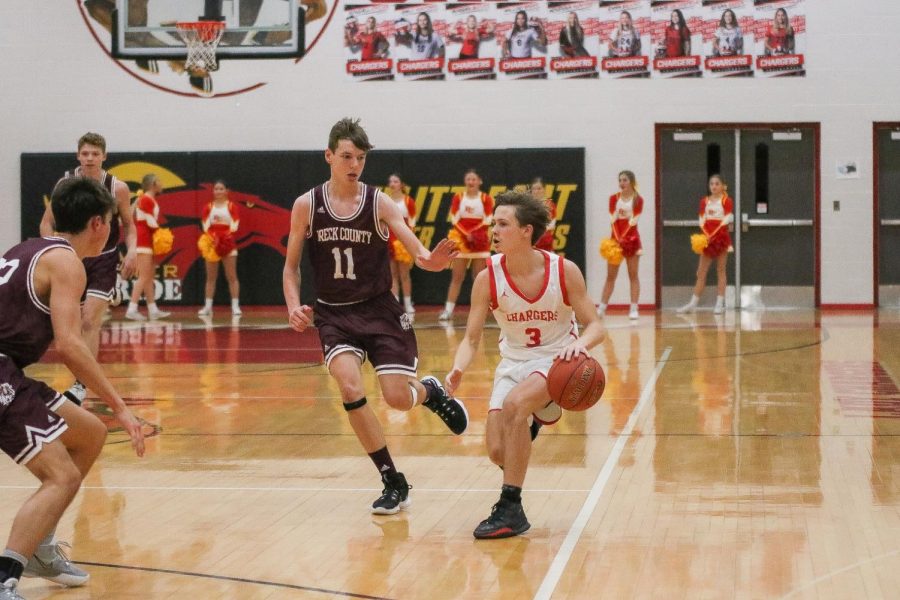 Freshman Nate Wilson running the ball down the court. “We hit the open shots we needed to hit and played pretty good defense,” Wilson said.