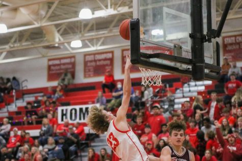 The boys won against Breckinridge County 67-47. Sophomore Andrew Jackson slams the ball into the basket. “It felt good and exciting to make something happen,” Jackson said.