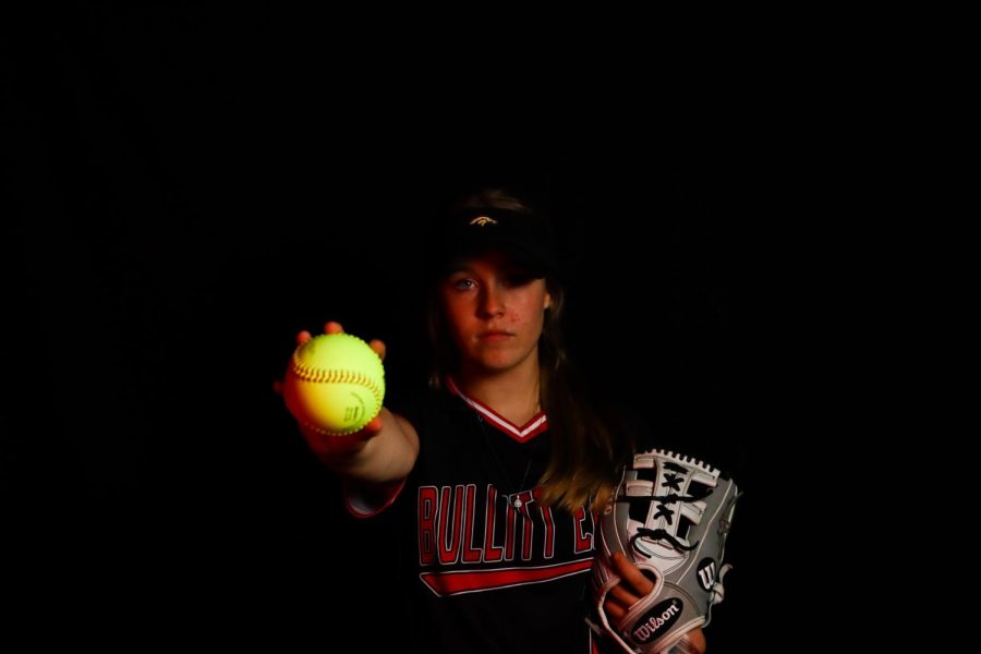 Junior Kimberly Perkins holding softball out in front of her. Perkins believes that the team will go far this year. "With a new coach, I think we are finally starting to come together, especially since last season. We made it to the regional championship. So, I think this year, we're heading for state," Perkins said.