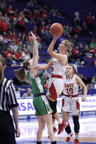 Lilly Reid leaps into the air for a layup. On March 11 the lady chargers played at Rupp Arena in the KHSAA state tournament against Meade County. "It's every high school player's dream to get to the state tournament," Reid said. 