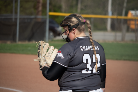Bibb looks at the softball in her hand before throwing it to the pitcher. Each game the girls worked collaboratively to achieve as much success as they could. "We've really played together, and we've really played our hearts out this season," Bibb said.  