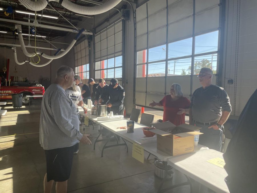 Community members talk to the staff of County Circuit Clerk, Paulita Keith. Last weekend, the community came together for a charity chili cookoff. "We're just here to support this cause," Keith said. 