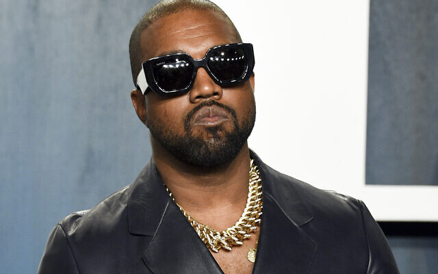 FILE - Kanye West arrives at the Vanity Fair Oscar Party on  Feb. 9, 2020, in Beverly Hills, Calif. West, who goes by Ye, is ending the contract between his company Yeezy and the struggling clothing retailer, confirmed his lawyer in an emailed statement to The Associated Press Thursday, Sept. 15, 2022. (Photo by Evan Agostini/Invision/AP, File)