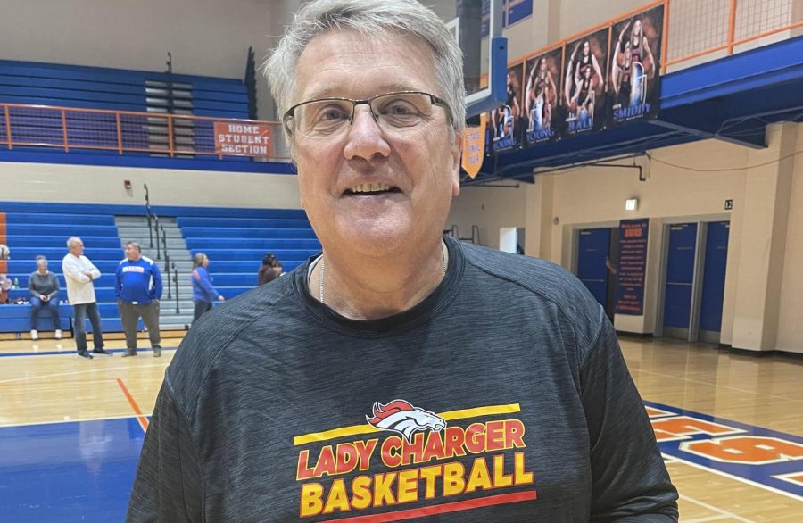 chris with his 500th win game ball. cropped