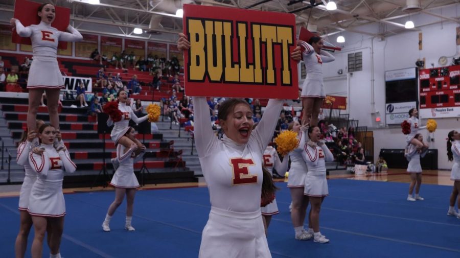 Junior Kaylie Scott performs her part of the routine. The cheer team had their Louisville Invitational Tournament (LIT) competition at Valley Traditional High School on Jan. 22. “The girls and I have been working extremely hard to stay consistent with our stunts and tumbling, this close to leaving (for Nationals). That's really the most we can do,” Scott said. 
