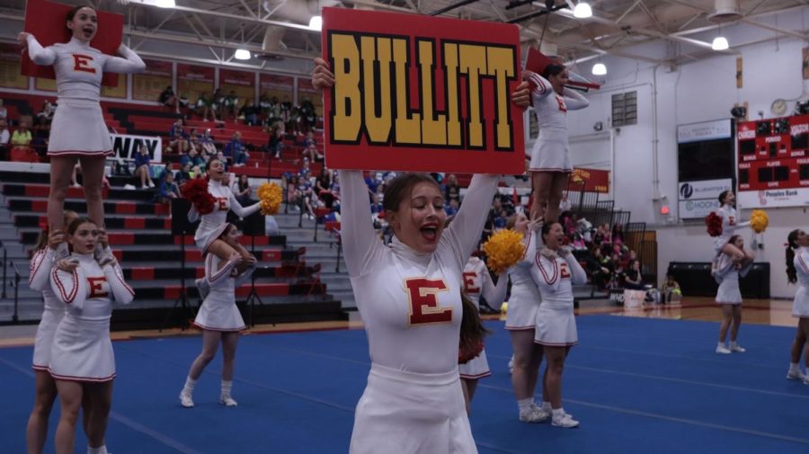 Junior Kaylie Scott performs her part of the routine. The cheer team had their Louisville Invitational Tournament (LIT) competition at Valley Traditional High School on Jan. 22. “The girls and I have been working extremely hard to stay consistent with our stunts and tumbling, this close to leaving (for Nationals). Thats really the most we can do,” Scott said. 