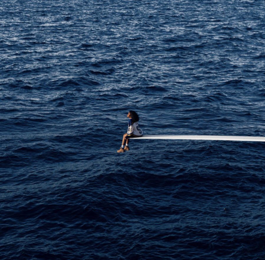  The “SOS” album cover depicts SZA on the edge of a diving board looking out at the sea. The photo was inspired by a similar one taken of the late Princess Diana.