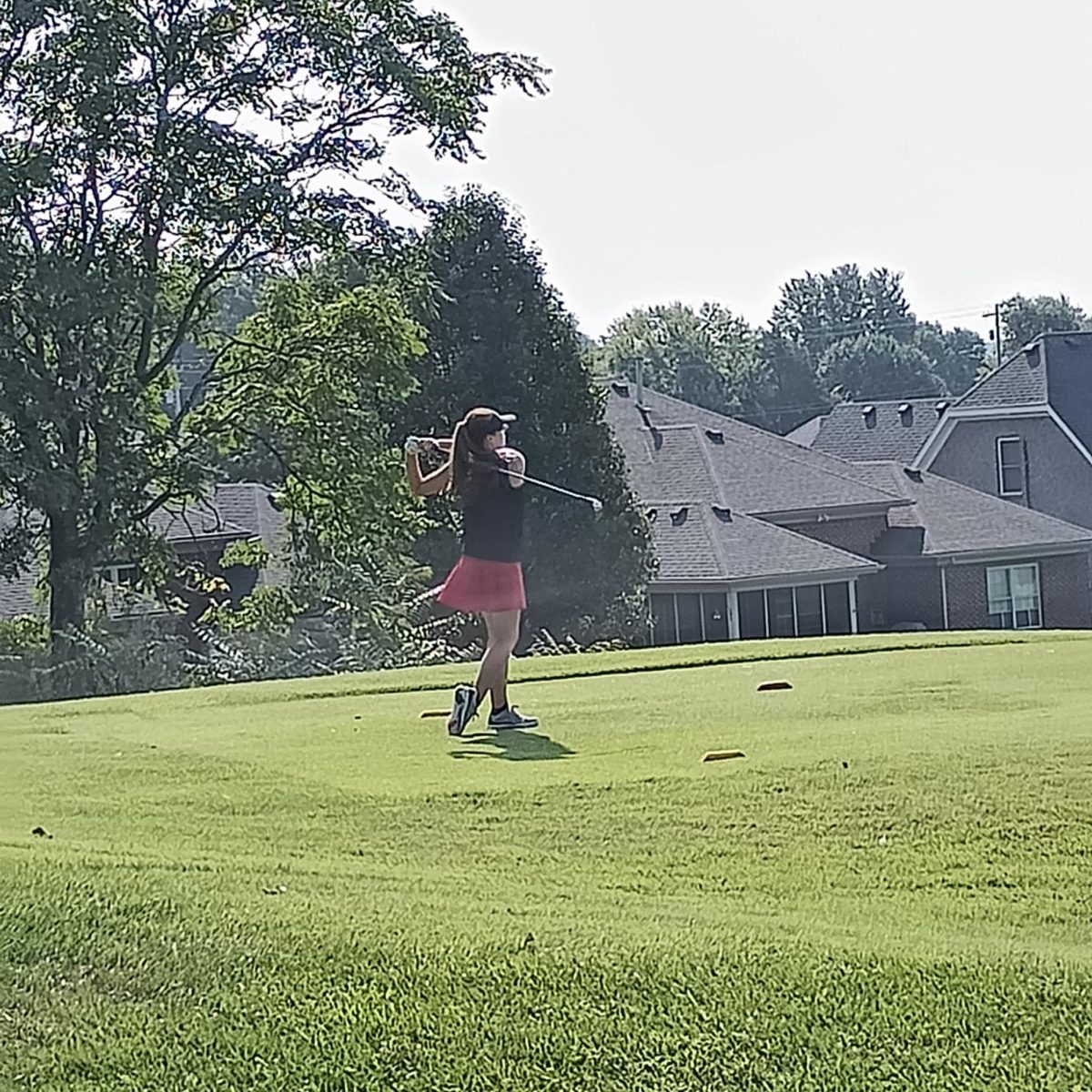 Grace+Shepard+is+pictured+teeing+off+on+hole+15+at+the+Bluegrass+Invitational.