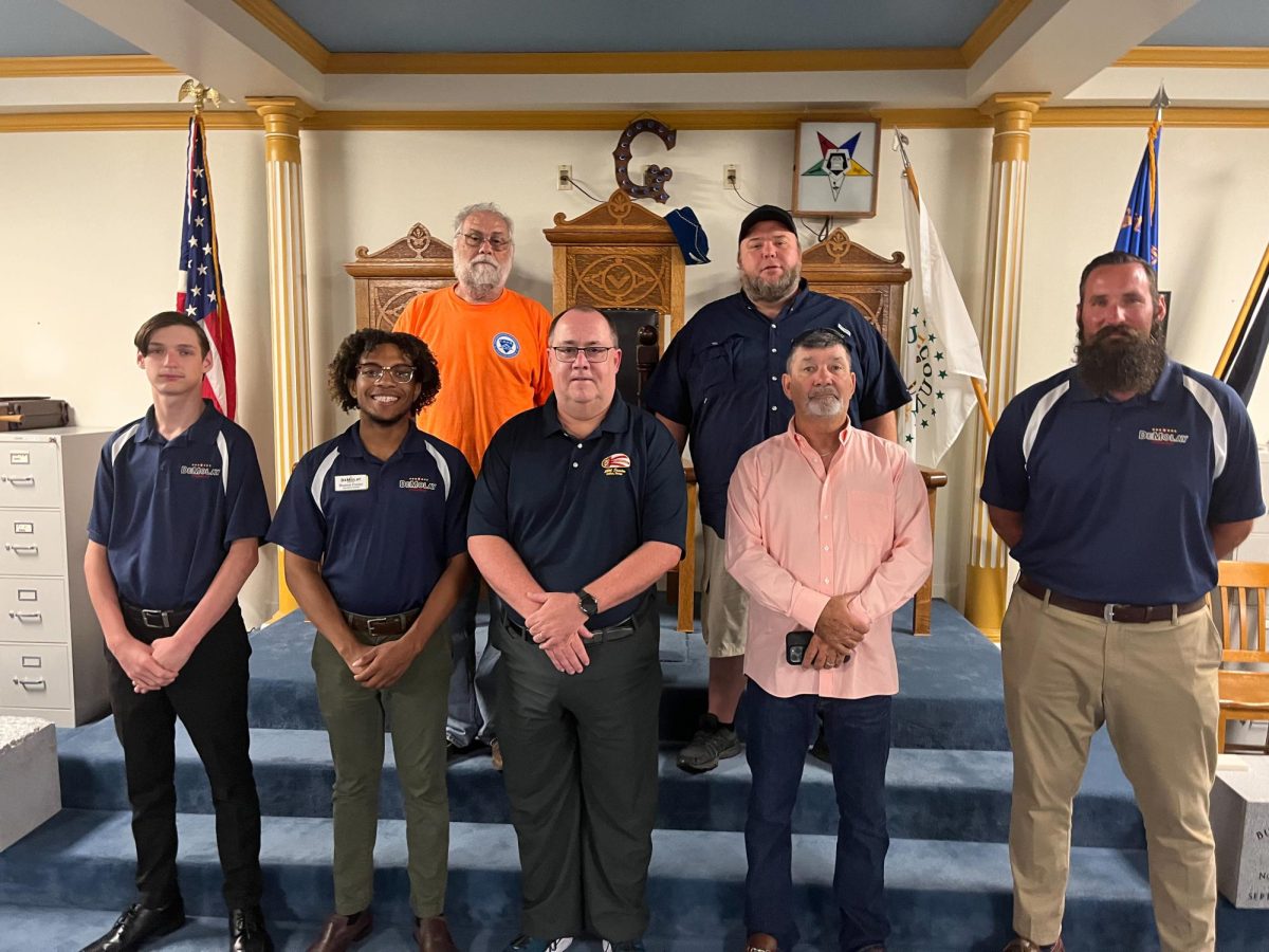 Members of the Freemason Lodge in Shepherdsville, Kentucky and their local Demolay organization lined up for a photoshoot.