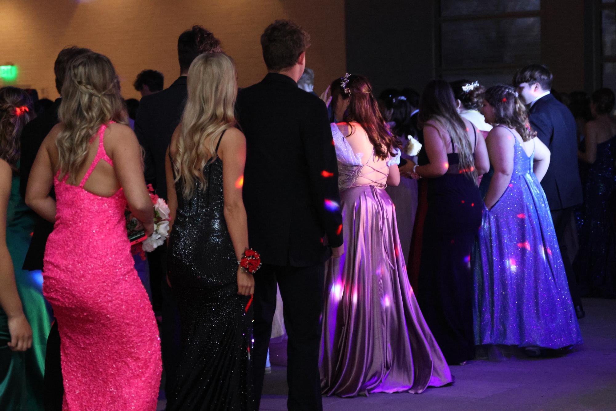 Students dance the night away at prom regardless of the theme. Although insignificant, students want their choice in the theme. The theme isnt really that serious, it doesnt really affect anything but its the principle of the matter, senior Olivia Cole said.