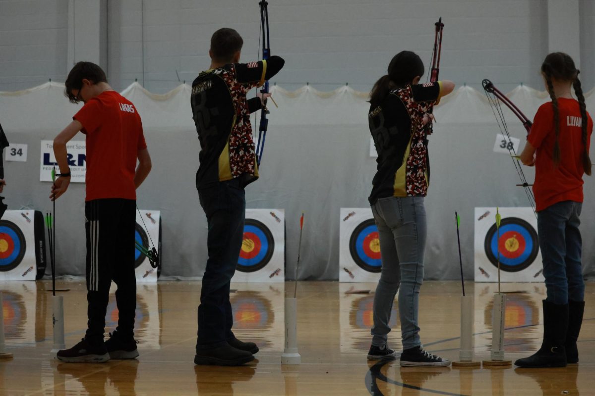 The archers compete in a tournament at Mercy Academy. They have worked on shooting from both 10 meters and 15 meters. First you shoot a ten meter practice round followed by three rounds of ten meter scoring rounds, Campbell said. 