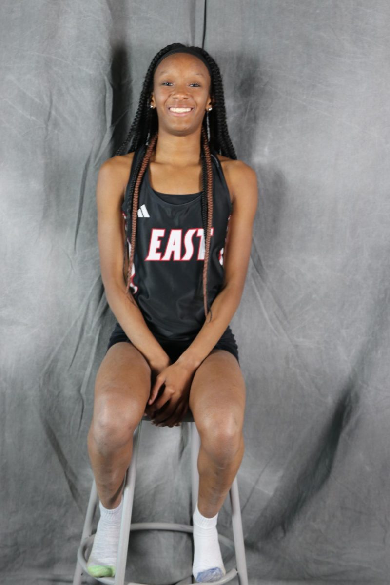 Track Runner Jay Jay poses for media day.