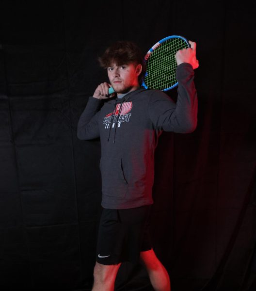 Senior Andrew Kruse prepares for upcoming regionals as well as the end of tennis season. Ive had the opportunity to go play for a chance of a state title for our school and you get to meet great people. Kruse said.