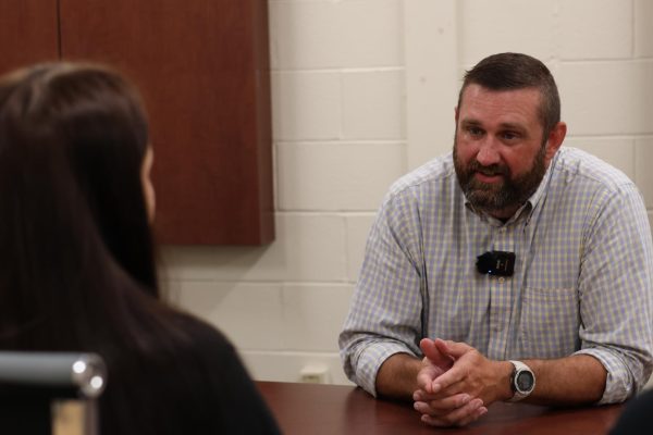 New Principal Josh Lightle answers a question from yearbook editor-in-chief Bailey Basham. 