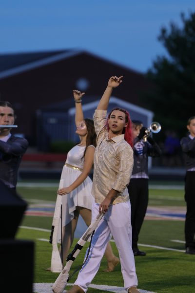 Color Guard during their first live performance at Christian Academy. They've been practicing this performance for months now. "“I really hope we improve by working hard and practicing more,"said Molly Rushing.