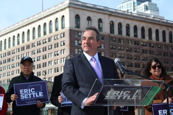 Eric Settle (left) joined former New Jersey Gov. Christine Todd Whitman (right) at a press conference in Philadelphia on March 26, 2024, where he signed a pledge to run for Pennsylvania attorney general as a Forward Party candidate.