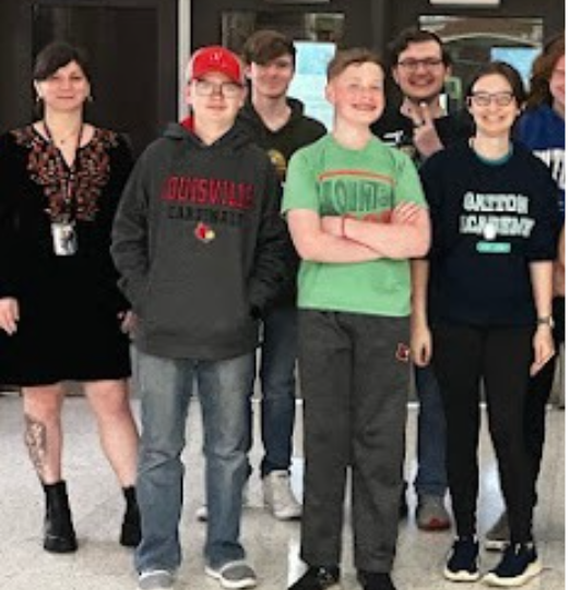 Miranda Flannery stands with a few Sci Fi Club Members. Each one played an important role in leading the group. "The students have really stepped up," Flannery said.