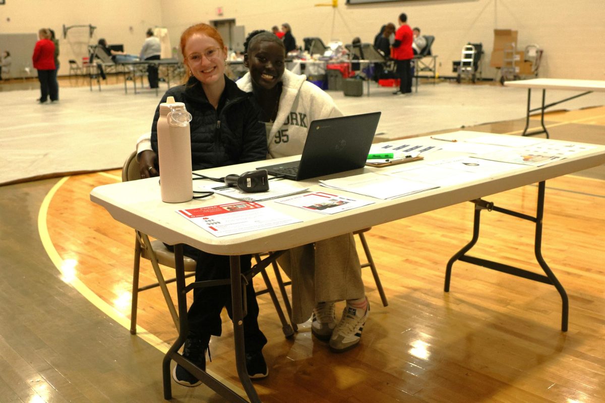 Bullitt East students check-in blood drive participants. Students volunteered, giving blood and becoming heroes to those in need. " 